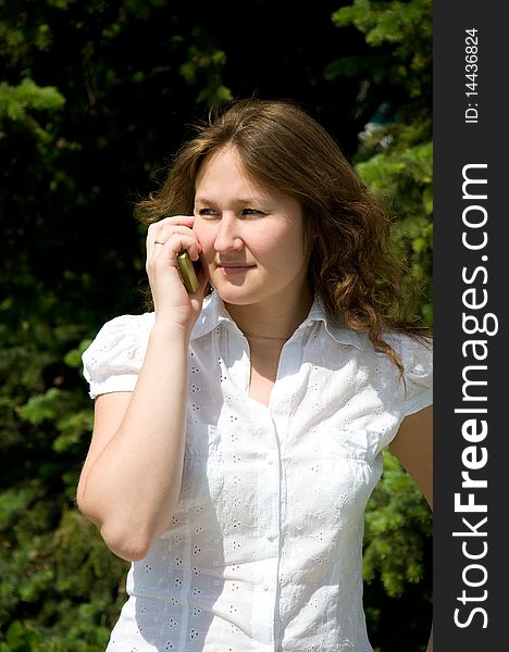 Serious adorable woman with phone