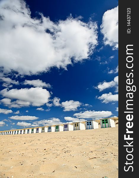 Small rental cabin on the beach with clouds in the blue sky