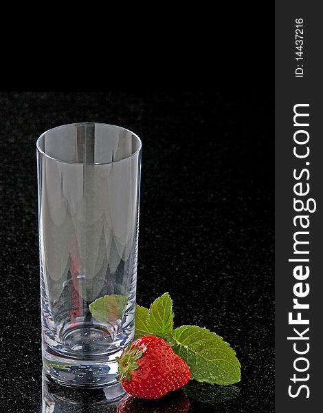 Glass with strawberries