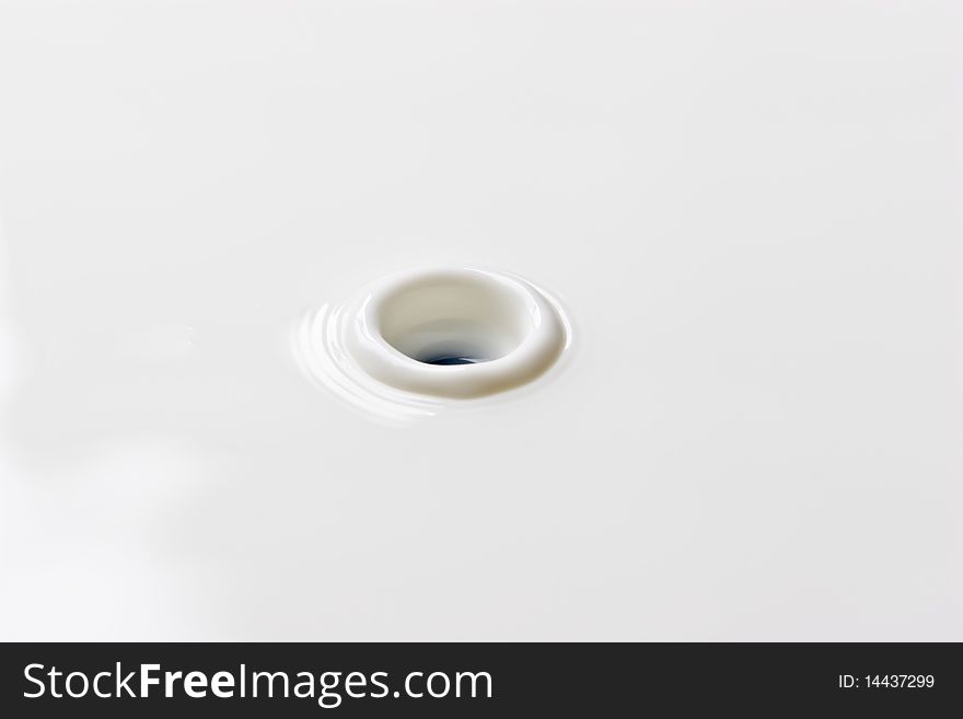 Milk drop creates ripple structure on surface. Milk drop creates ripple structure on surface