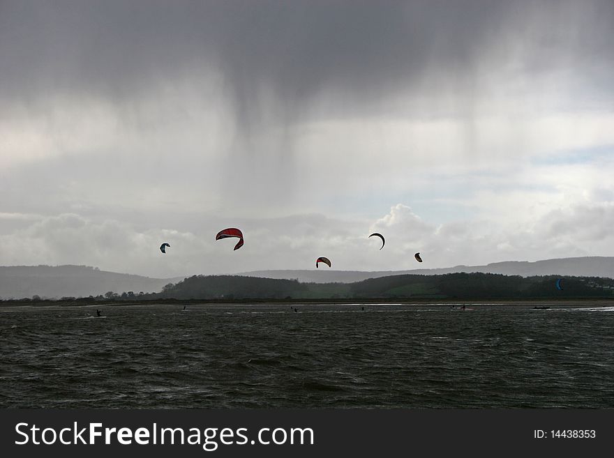 Kitesurfers In Storm