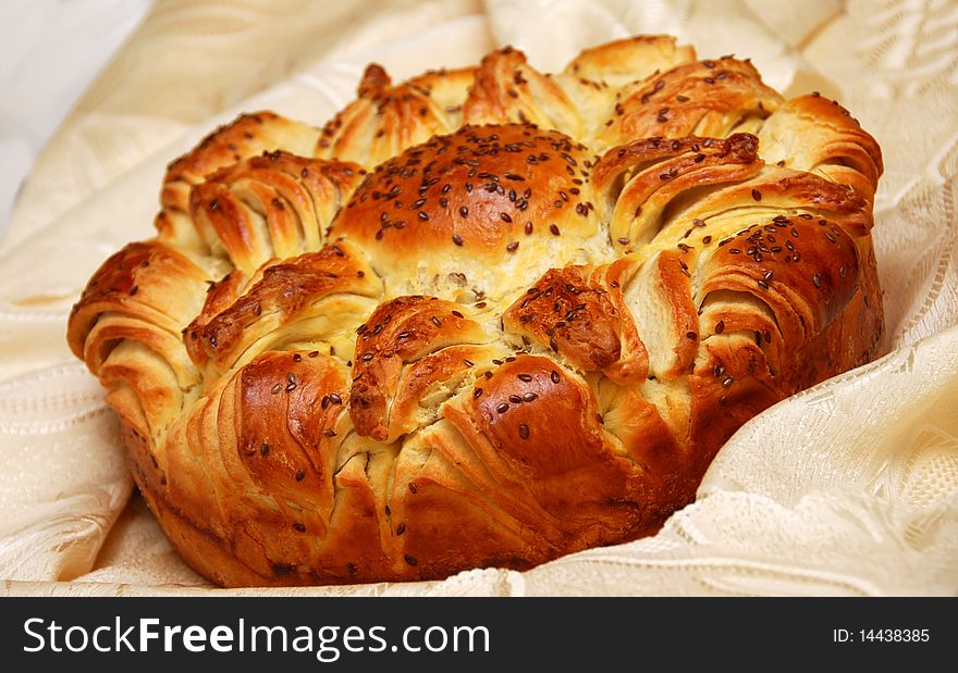 Appetizing fresh homemade decorative bread with flax seeds