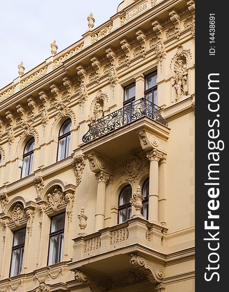 Fragment of Prague building with balcony