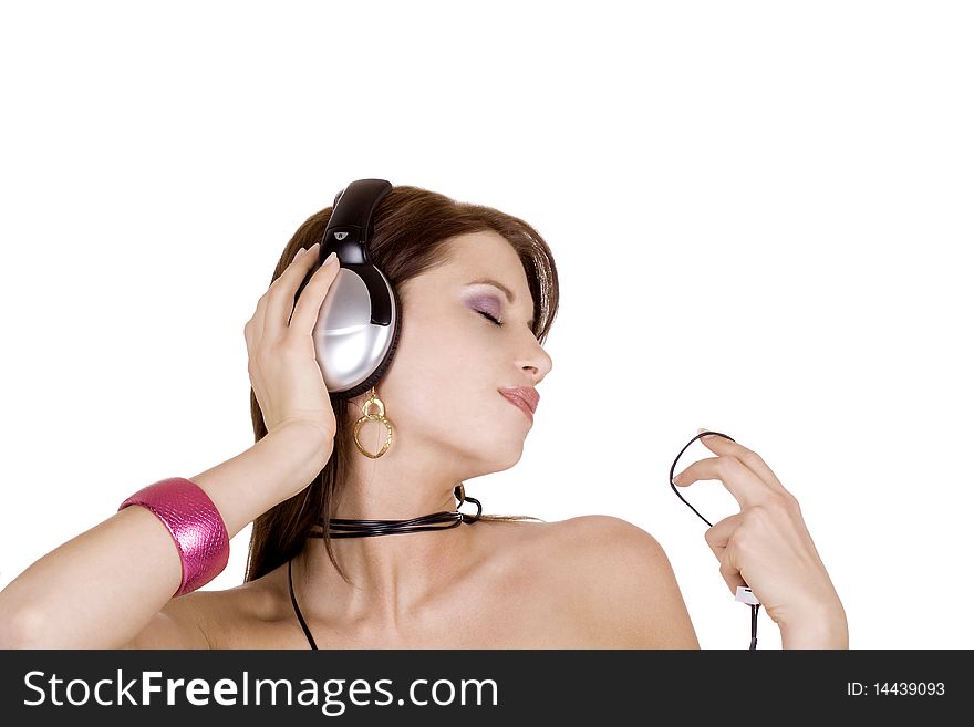Beautiful brunette woman enjoying music. Beautiful brunette woman enjoying music