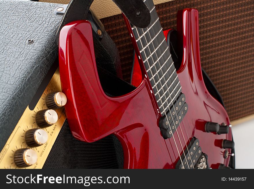 red electric guitar with two amps. red electric guitar with two amps
