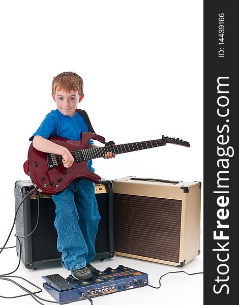 Five year old rockstar playing his guitar