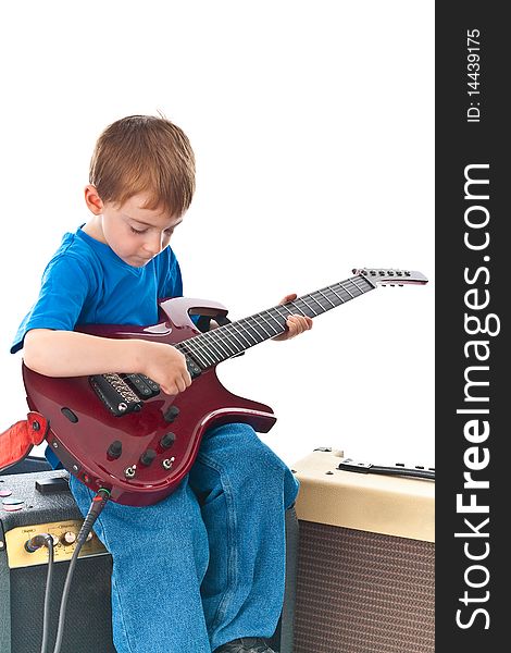 Five year old rockstar playing his guitar