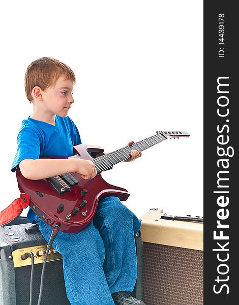 Five year old rockstar playing his guitar