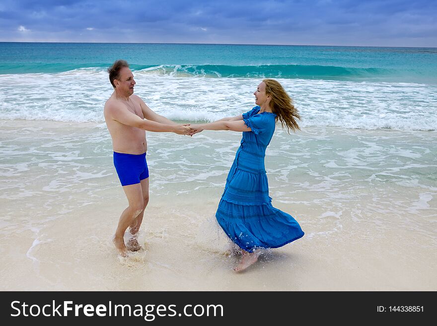 Loving couple on the seashore, Cayo Largo island, Cuba