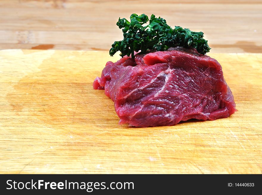 Raw Beef Meat On Cutting Board For Barbecue