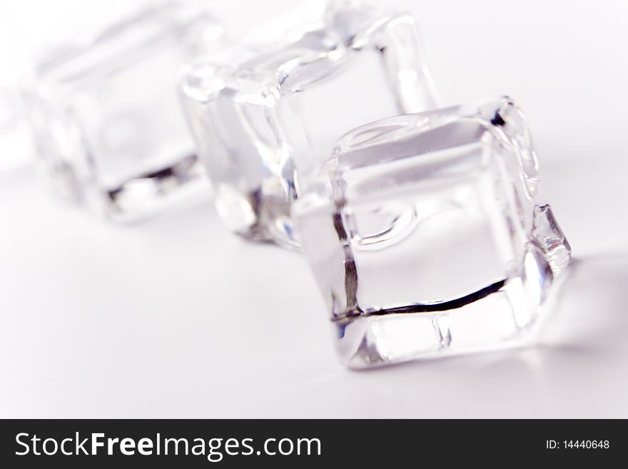 Ice cubes closeup on white background