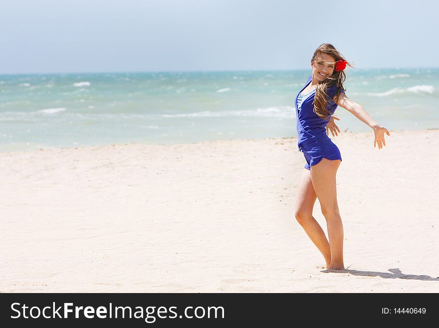 Happy Girl On Beach