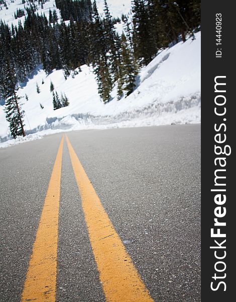 Artistic photograph of road leading up a snow covered mountain. Artistic photograph of road leading up a snow covered mountain.