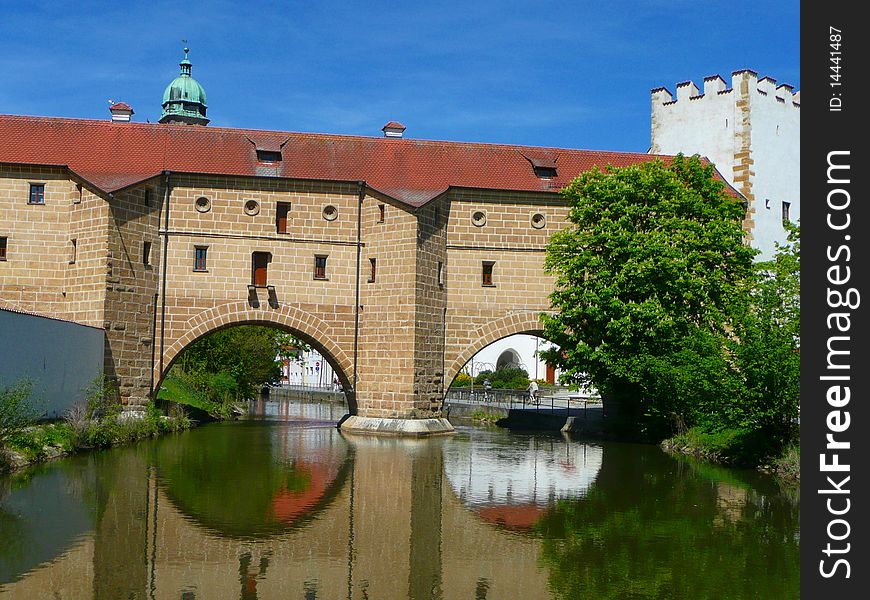 Amberg was first mentioned in 1034. The photo shows one of the defining symbols of the town, the Stadtbrille in English town spectacles. It is a bridge over the river Vils that is part of the town wall. The reflections in the water make the bridge look like a pair of glasses. Amberg was first mentioned in 1034. The photo shows one of the defining symbols of the town, the Stadtbrille in English town spectacles. It is a bridge over the river Vils that is part of the town wall. The reflections in the water make the bridge look like a pair of glasses.