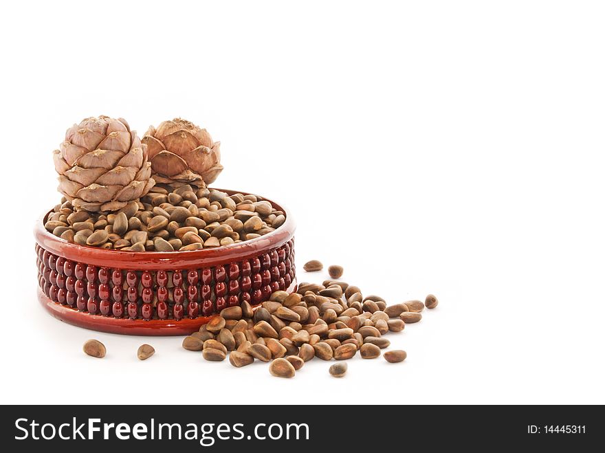 Cedar nutlets on a white background