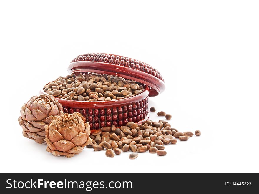 Cedar nutlets on a white background