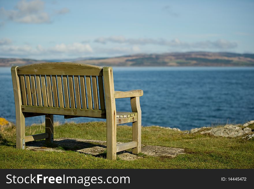 Bench looking out to sea with copy space.