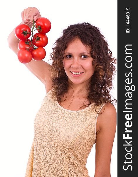 Pretty smiling woman holding branch of red tomatoes. Isolated over white background. Pretty smiling woman holding branch of red tomatoes. Isolated over white background.