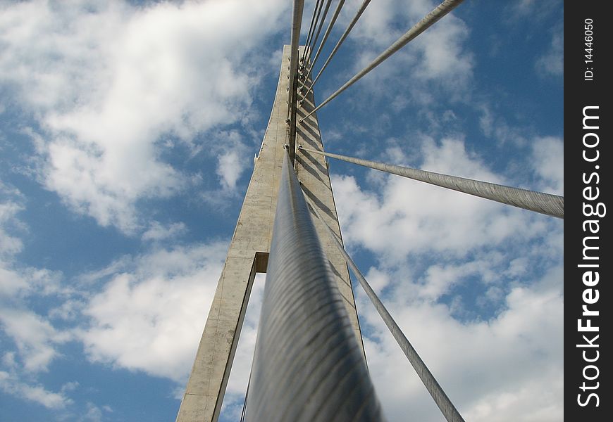 Looking up the cable of a suspension bridge in Spain. Looking up the cable of a suspension bridge in Spain
