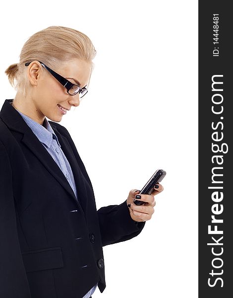 Business woman sending a text message on her mobile phone - isolated