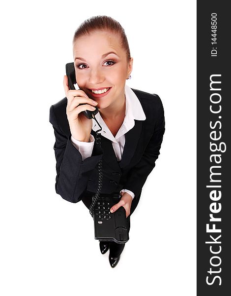 Portrait of young businesswoman with black telephone. Portrait of young businesswoman with black telephone