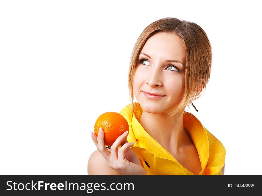 Picture of a young pretty girl in yellow dress which holds oranges. Isolated on white. Picture of a young pretty girl in yellow dress which holds oranges. Isolated on white.
