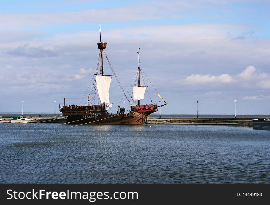 Old historic sailing ship in port of Curonian Spit in Lithuania.