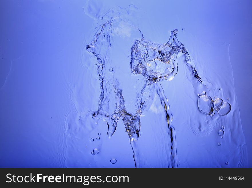 Abstract water splash which may be  used as  a background. Abstract water splash which may be  used as  a background