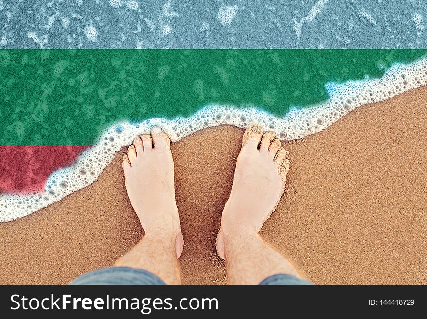 Surf on sandy beach with flag Bulgaria. Top view.