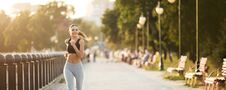 Millennial Fitness Woman Jogging Outdoors In Park Royalty Free Stock Photos