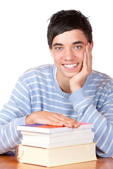 Happy Smiling Male Student On Desk With Books Stock Photos Happy Smiling Male Student On Desk With Books Stock Photos