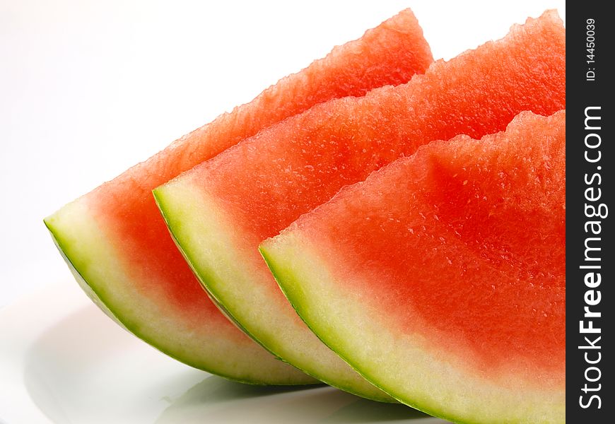 Fresh watermelon. Close up on white background.