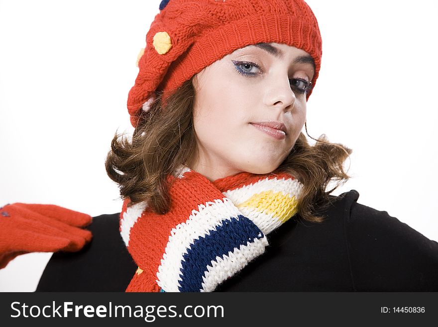 Young pretty warmly clothed woman in studio. Young pretty warmly clothed woman in studio