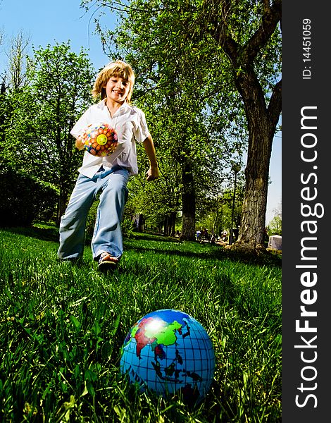 Boy with ball in park