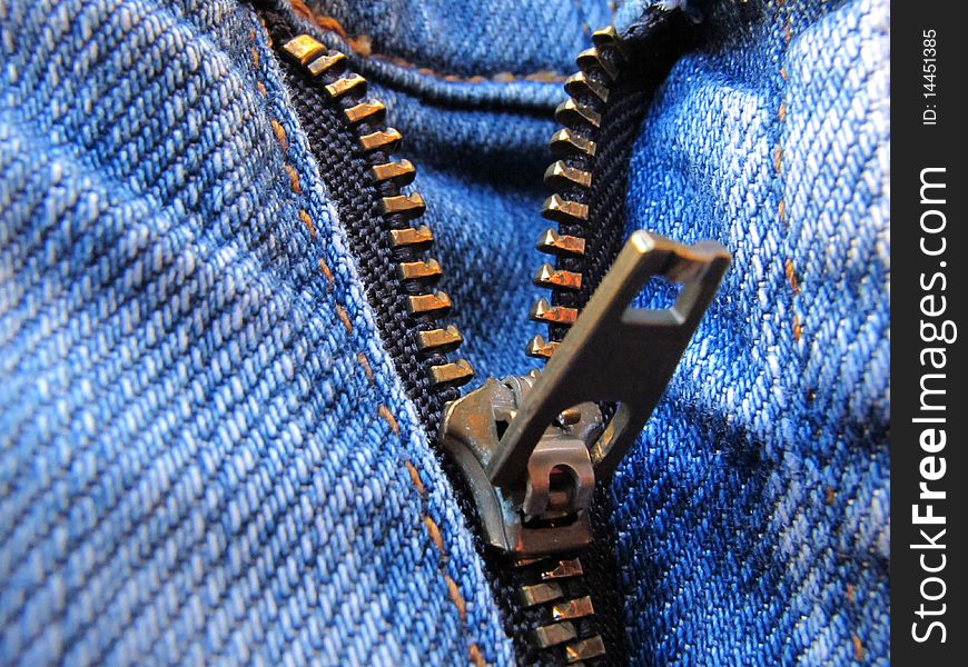 Macro of a jeans's zipper. Macro of a jeans's zipper