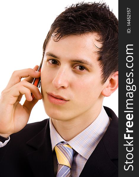 Young business man on the phone, isolated on white background