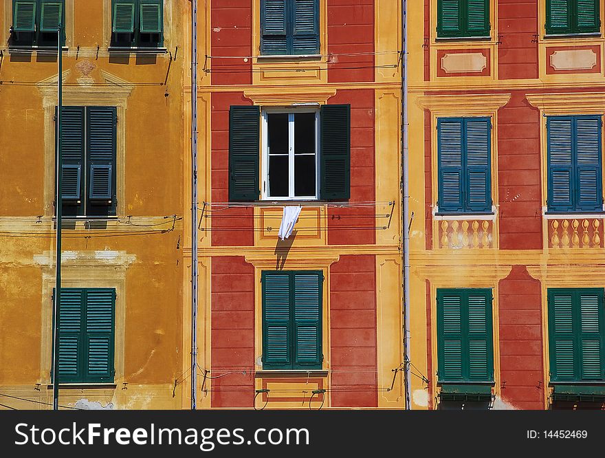 Coloured walls of the houses in an italian harbour. Coloured walls of the houses in an italian harbour