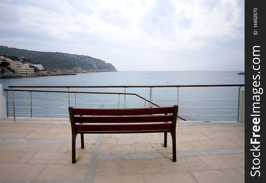 Wooden bench with sea view