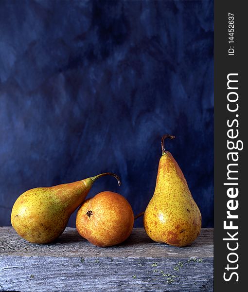 Three pears isolated on painted background