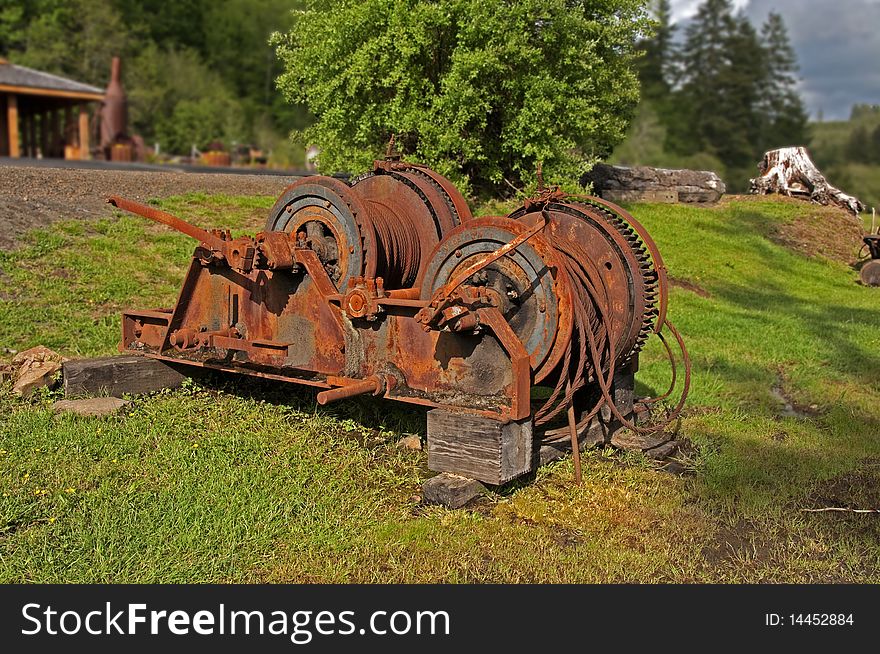 Old rusting winch used in the logging industry