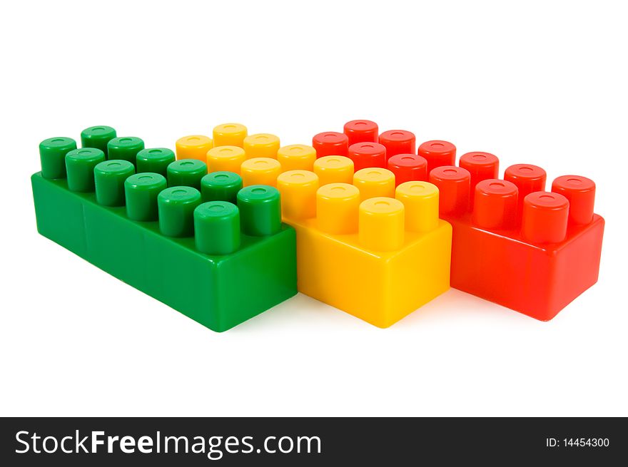 Stack of colourful building blocks isolated on a white background