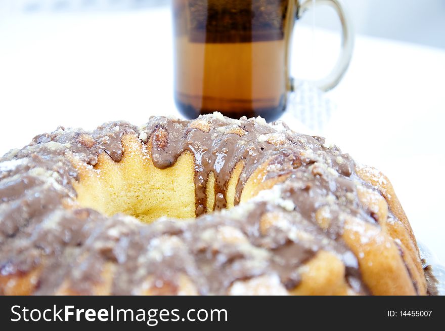 Marble cake on plate with tea. Marble cake on plate with tea