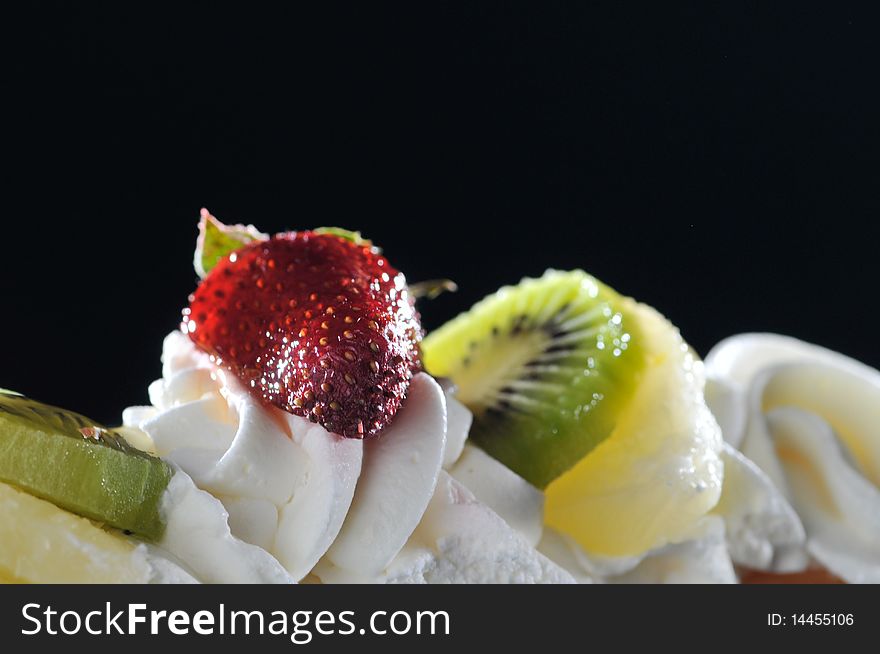 Eclair with whipped cream and fruit. Eclair with whipped cream and fruit