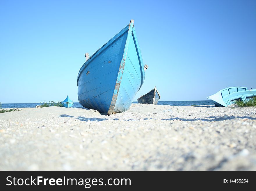 Fishing boat on the beach on a nice day