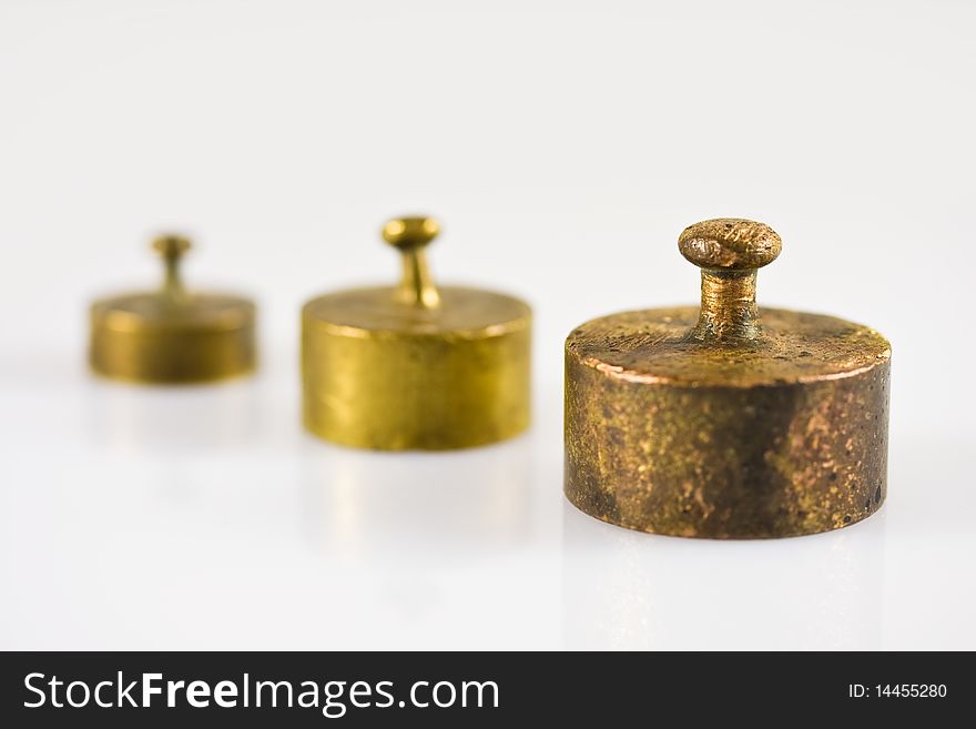 Three weights on a white background
