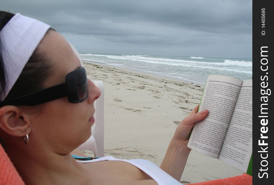 Reading On The Beach