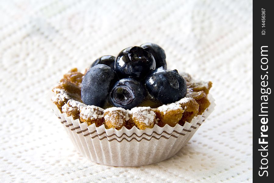 Pie pastry with blueberries on a white background. Pie pastry with blueberries on a white background