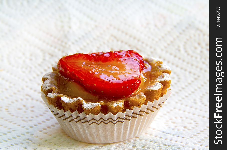 Pie pastry with strawberry on a white background. Pie pastry with strawberry on a white background