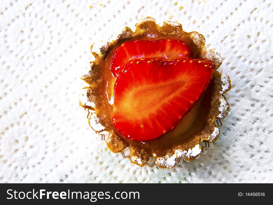 Pie pastry with strawberry on a white background. Pie pastry with strawberry on a white background