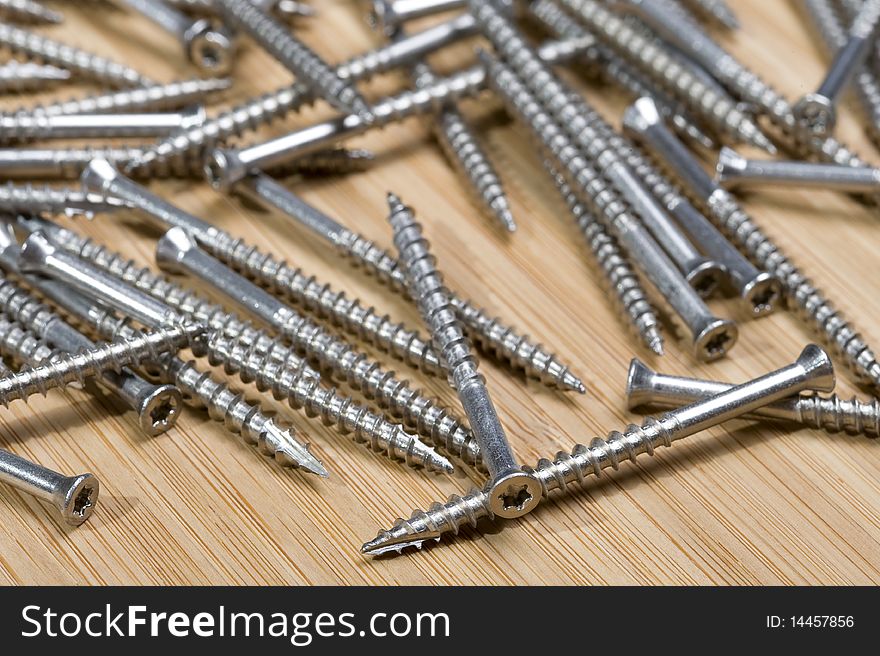 Background with screw. Construction equipment